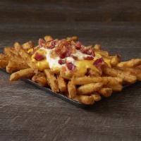 Fully Loaded Fries · Our Famous Seasoned Fries topped with cheese, ranch and crispy bacon.