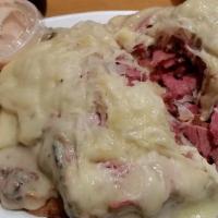 Irish Reuben · Corned beef on rye with sauerkraut, Swiss and Russian dressing.