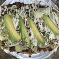 Huaraches · Served with lettuce, pico de Gallo (tomato,onion,cilantro), avocado, sour cream and cheese