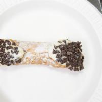 Chocolate Chip Cannoli · A traditional, Ricotta-filled cheese cannoli dipped in chocolate chips.
