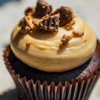 Peanut Butter Cup · Chocolate cake with peanut butter cream cheese frosting topped with crumbled peanut butter c...