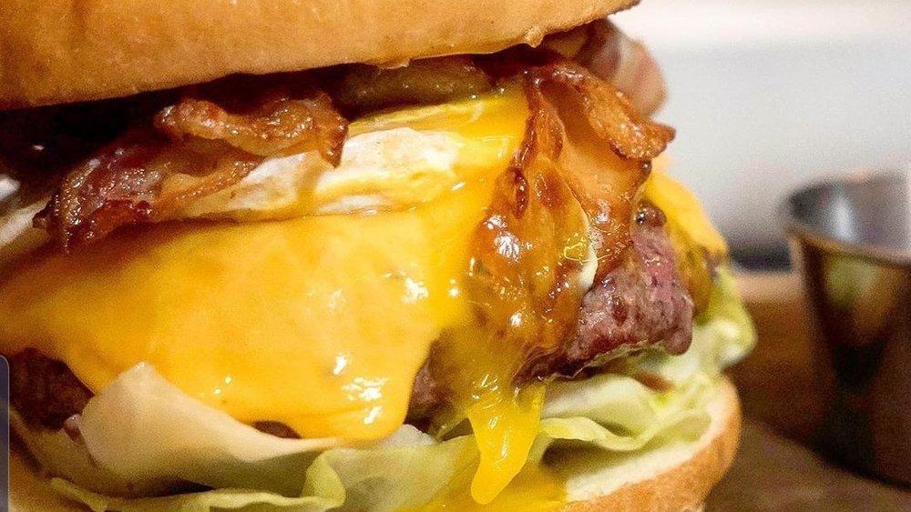 Bullseye Burger · Served with bacon, fried egg, and cheddar cheese.