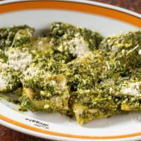 Ravioli Al Pesto · Ricotta and spinach ravioli with our homemade pesto sauce.