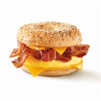 Bacon Everything Bagel · Double the bacon, double cheese, and a warm egg omelette on an everything bagel