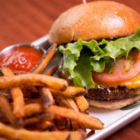Angus Beef Burger · Juicy angus beef stuffed in between a fresh baked bun with the choice of add ons.