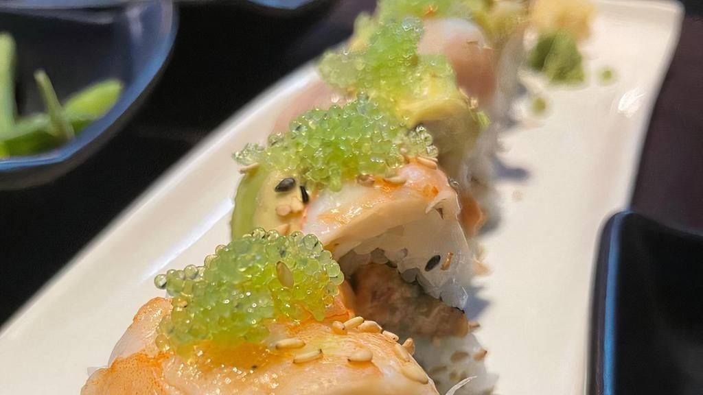Tokoname Roll (Specialty Roll) · Maguro hamachi sake avocado ebi and wasabi tobiko on top with spicy ahi tuna cucumber and kaiware in the center
