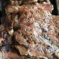 Ribeye Steak · Served sizzling with mushrooms and onions