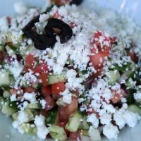 Greek Salad · Tomato, cucumber, feta, red onion, dill, & black olives.