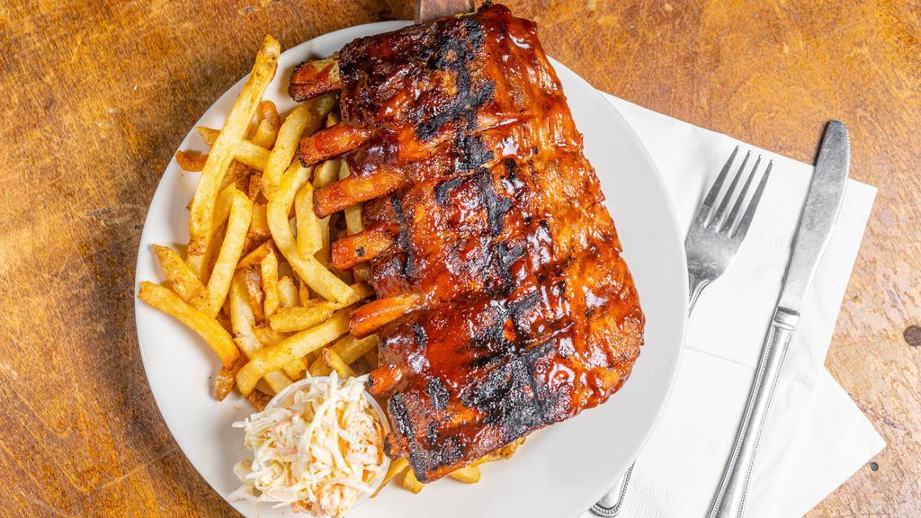 1/2 Slab Baby Back Ribs · With fries and coleslaw.