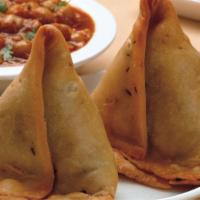 Vegan Plain Samosa (2) · Two home made samosa served with hot and sweet dip.