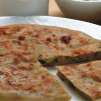 Vegan Tawa Paratha Meal (Stuffed Bread) · Choice of paratha,one curry, one chickpea curry, papad, vegan drink, vegan cookie.