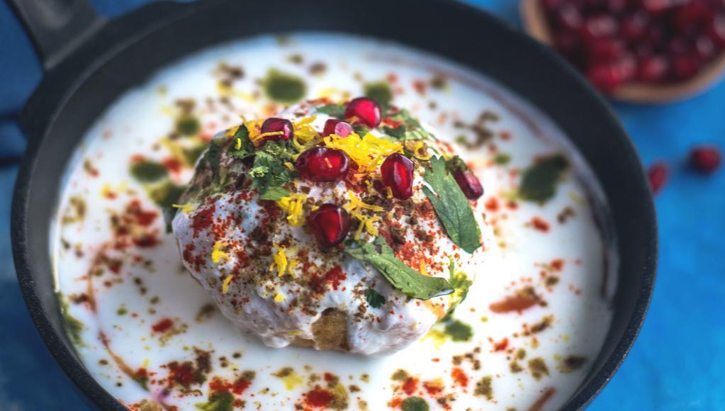 Dahi	Vada · Soft Lentil balls topped with various spices, crisps, sauces and finished with yoghurt.