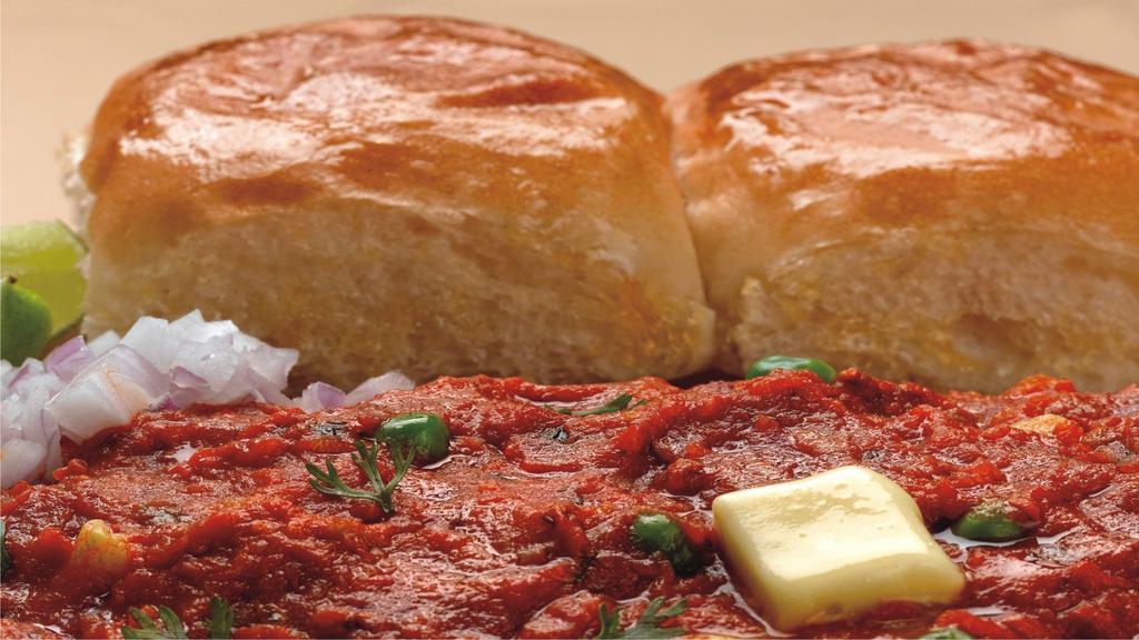 Tawa	Pav	Bhaji · Very Famous street food cooked mashed vegetables served with two buns.
