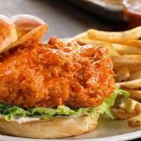 Spice Chicken Sandwich Deluxe Combo · Fries and soda,
Deluxe sandwich includes lettuce and tomatoes