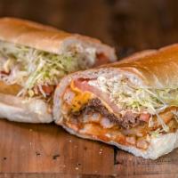 Fat Mr Sub · Cheesesteak, Mozzarella Sticks, Fries, Lettuce, Tomato, ketchup & mayo on a fresh baked ital...