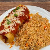 Chimichanga · Your choice of marinated chicken or steak, pico de gallo, and Monterey jack cheese wrapped i...
