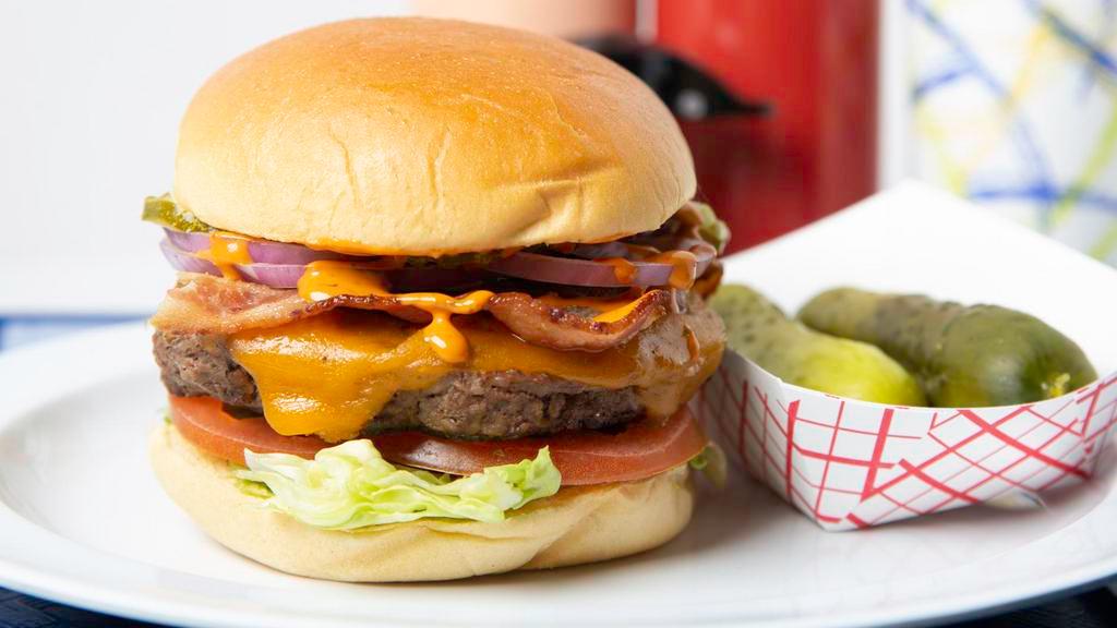 Spicy Chipotle Burger · 6 oz. patty, bacon, cheddar cheese, lettuce, tomato, red onions, pickles, spicy chipotle mayo.