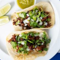 Chorizo Taco · Mexican chorizo, white onions, cilantro. Salsa Verde and lime on the side. (1 Taco )