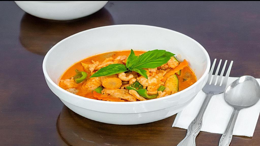 Red Curry · Bamboo shoot, string beans, basil leaf, bell pepper, onion zucchini, mushroom, babycom, with coconut milk and curry paste. Served with jasmine rice or brown rice. Hot and Spicy.