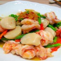 Xo Seafood · Grilled shrimp, scallop, lobster tail with bell peppers, onions, and sweet peas with XO sauc...