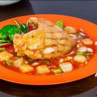 Crispy Red Snapper · Spicy! Onion, pineapple, bell pepper in special sweet chilli sauce over red snapper. Served ...