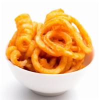Curly Fries · Spiralized potatoes, deep fried and seasoned.