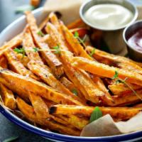 Sweet Fries · Crispy, craveable sweet potatoes fries salted  to perfection.