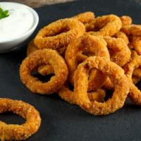 Onion Rings · Battered onions deep fried to crispy, crunchy  perfection.