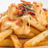 Cheese Fries · Crispy, craveable french fries covered with  cheese.