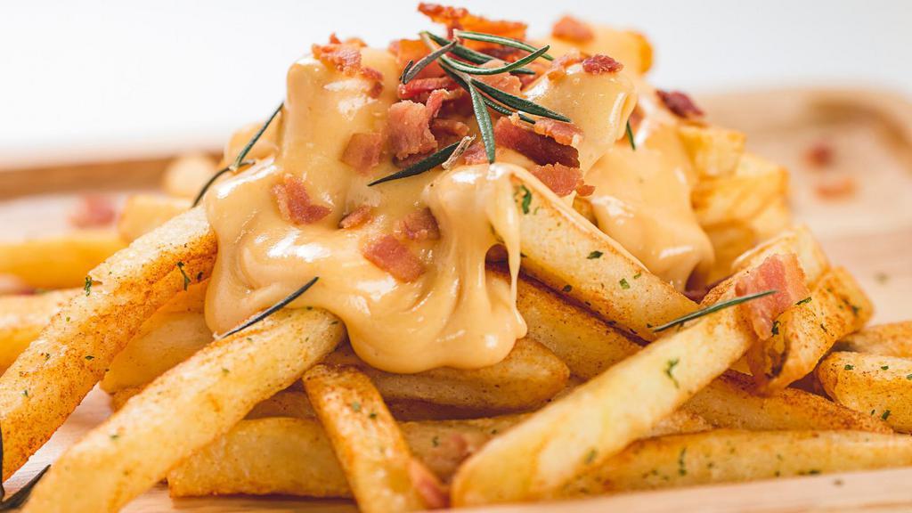 French Fries With Cheese · Golden crispy deep-fried French fries topped with melted mozzarella cheese.