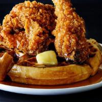 Fried Chicken & Waffles · Waffle served with four pieces of fried chicken & our homemade honey maple barbecue sauce.