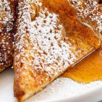 Cinnamon Raisin French Toast · Served With Butter & Syrup.