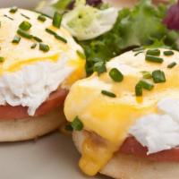 Classic Eggs Benedict · Two Poached Eggs, Canadian Bacon & Hollandaise. Served Over Toasted English Muffin With Home...