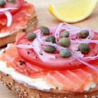 Norwegian Smoked Salmon Bagel Deluxe · Toasted Bagel, Smoked Salmon, cream cheese, olives, red onions, lettuce & tomato.
