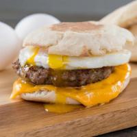 Sausage & Egg Muffin · A toasted English Muffin, Scrambled Eggs With Country Sausage Patties. Covered with Melted C...