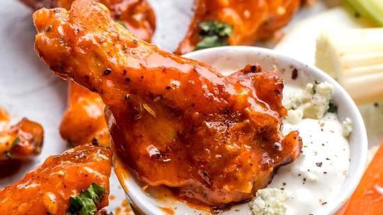 Original Style Buffalo Chicken Wings · Traditional Style. No Breading. Order Them With Your Favorite Wing Sauce & Dressing. Served With Carrots & Celery Sticks.