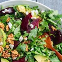 Goat Cheese & Beets Salad · Mesclun mixed greens, cherry tomatoes, cranberries, avocado, glazed walnuts, red beets, topp...