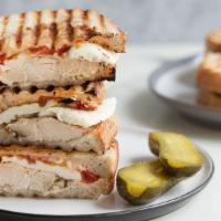 Marinated Chicken (Wrap Or Panini) · Marinated Chicken Breast, Eggplant & Peppers, Mozzarella Cheese, Fresh Basil, A Spread Of Pe...
