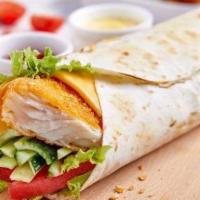 Fish Fillet (Wrap Or  Panini) · Avocado, lettuce, tomatoes, red onions and homemade chipotle tartar sauce.