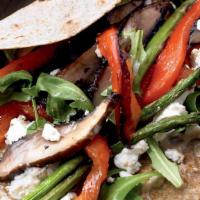 Mushroom · Brie or goat cheese, sauteed portobello and white mushrooms, sauteed onions and peppers with...