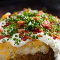 Stuffed Baked Potatoes · Served with butter & sour cream.