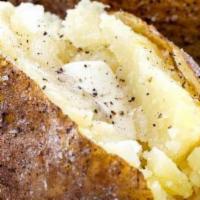 Baked Potato · Served with sour cream & butter.