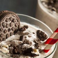 Oreo Cookies Milkshake · Oreo cookies ice cream and chocolate syrup topped with our homemade whipped cream.