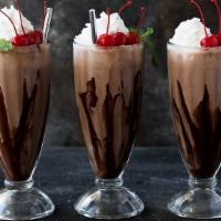 Black Forest Milkshake · Chocolate ice cream, fresh strawberries and chocolate syrup topped with our homemade whipped...