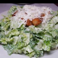 Classic Caesar Salad · Crisp Romaine, Pecorino Romano, Ficelle Croutons.