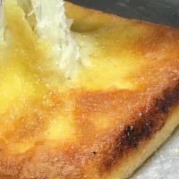 Saganaki Kefalograviera · (Imported Greek Cheese), Pan Seared in Olive Oil, Flamed with Ouzo.