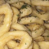 Calamari · Lightly Fried Rings of Tender Calamari, Lemon, Marinara Sauce or Asian Style.