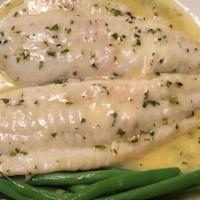 Filet Of Sole Meuniere · sauté with lemon juice, butter and parsley, served with Jasmine rice, Sautéed Green Beans.