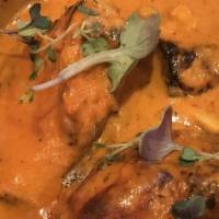 Dilli Wala Butter Chicken (On The Bone) · An Old Delhi classic, chicken on the bone cooked in a creamy tomato gravy.