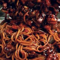 Spicy Black Cold Noodles With Raw Fish · 